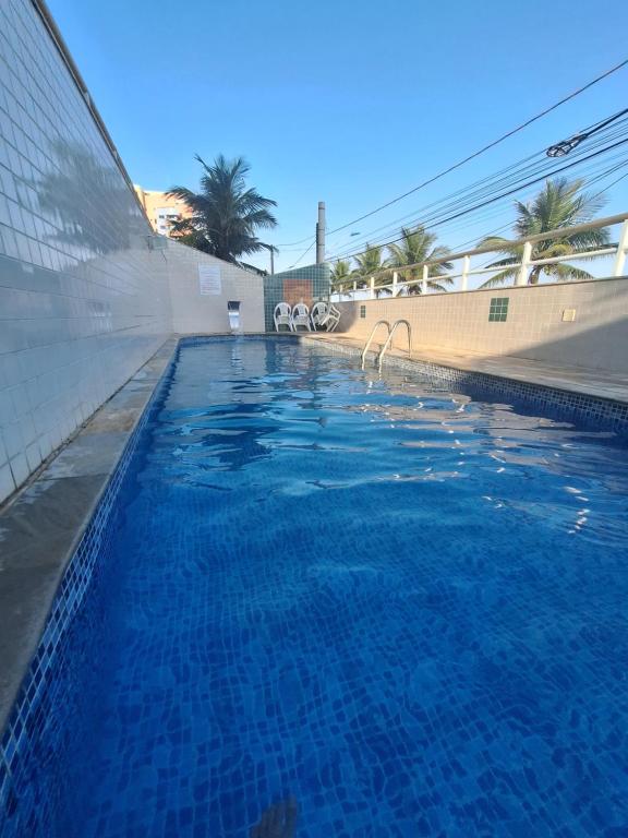 Πισίνα στο ή κοντά στο Apartamento Frente Mar com Piscina 500MB Mongaguá