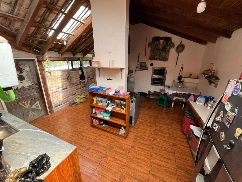 an aerial view of a kitchen and living room at Pakarina Hospedaje in Cotacachi