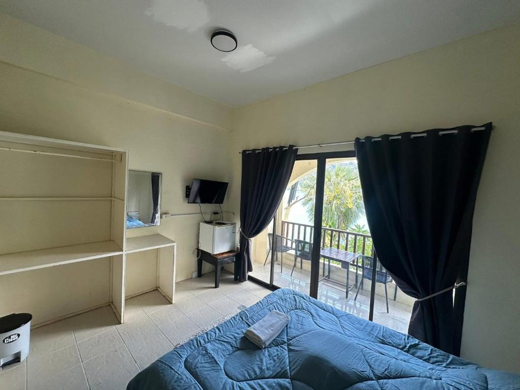 Et tv og/eller underholdning på Nanworld travel sea view room