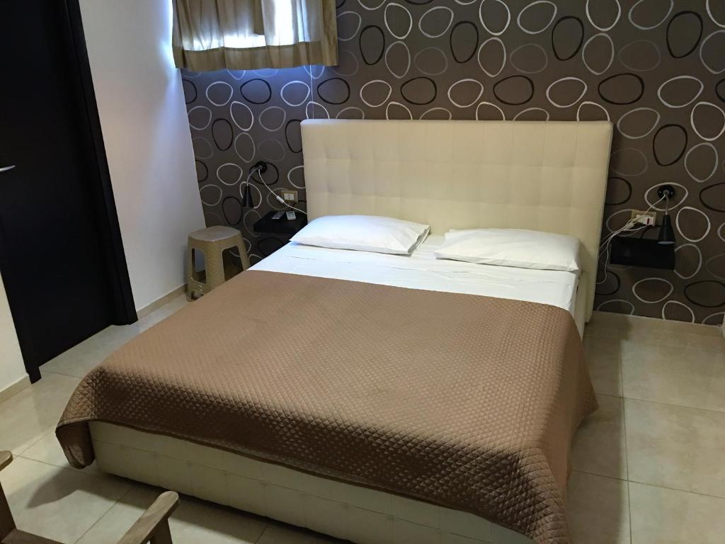 
A bed or beds in a room at Terrazza Partenopea
