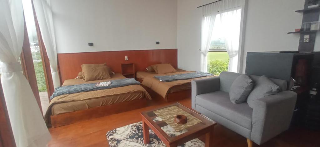 Postel nebo postele na pokoji v ubytování Cabin Wetan Kali 03