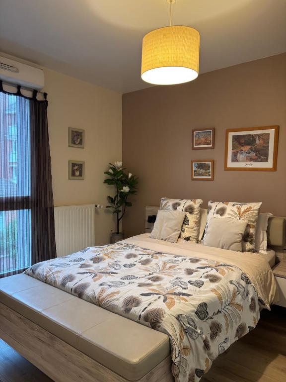 Ένα ή περισσότερα κρεβάτια σε δωμάτιο στο Jasmin