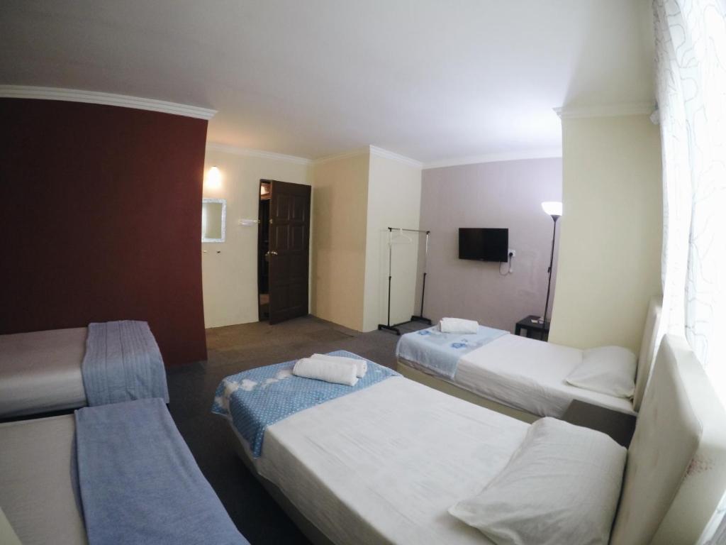 Ein Zimmer in der Unterkunft Na'iim Budget Hotel