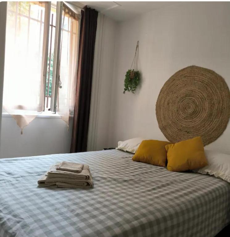 Ένα ή περισσότερα κρεβάτια σε δωμάτιο στο Le petit cocon