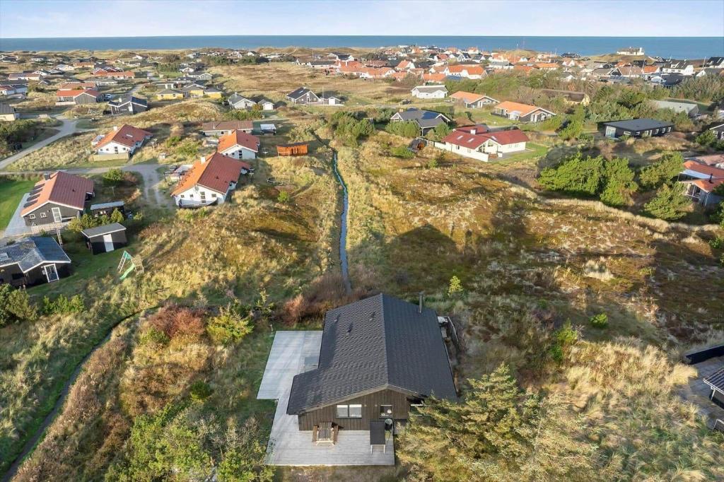 an aerial view of a house on a hill at 1071-Thisted-Gravsesvej-30 in Klitmøller