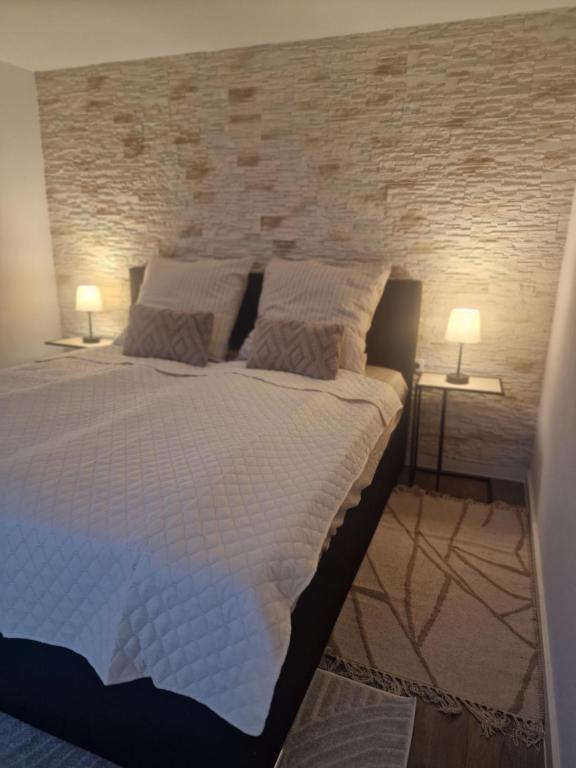 Postel nebo postele na pokoji v ubytování M&N Living