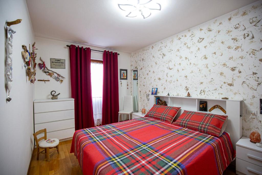 Giường trong phòng chung tại Casa Shiva