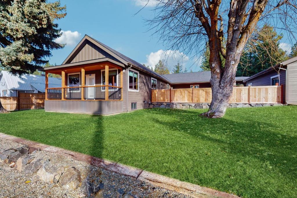 a home with a large yard with a house at No. 3 Coal Mine Cabin & Studio in Ronald