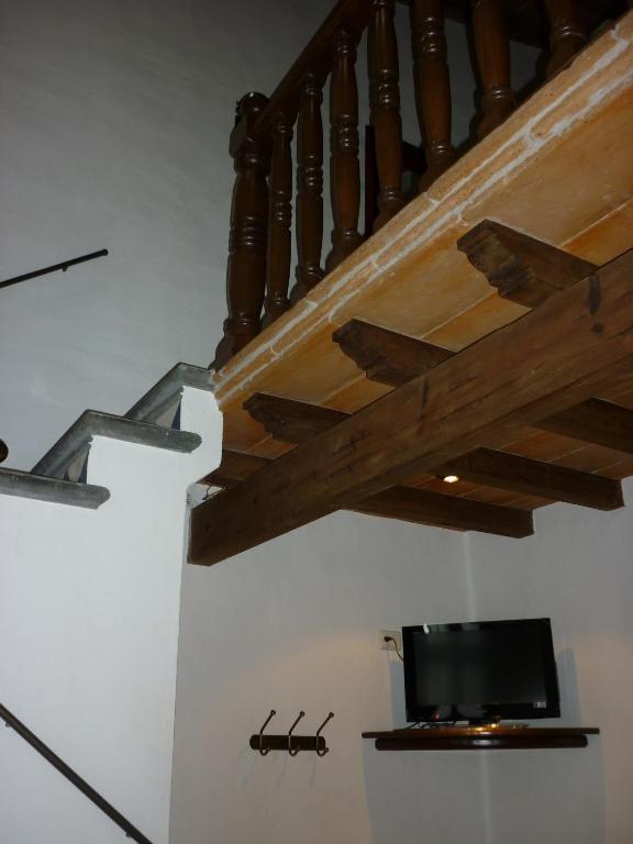 TV a/nebo společenská místnost v ubytování Meson del Alferez Coatepec