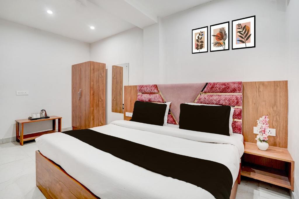 Ένα ή περισσότερα κρεβάτια σε δωμάτιο στο Townhouse Sarai Rohilla Railway Station Formerly Fortune Residency