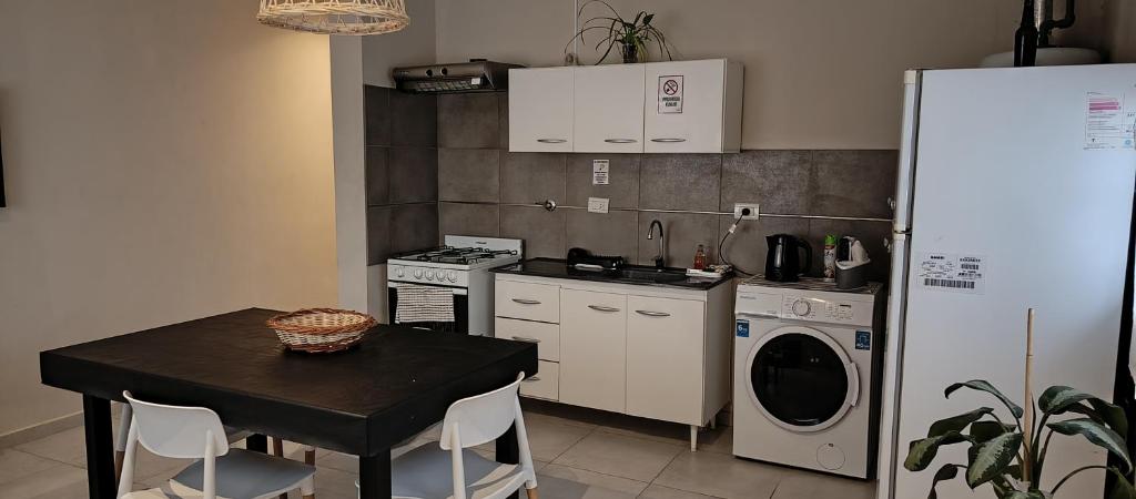 Køkken eller tekøkken på Apart Los Laureles