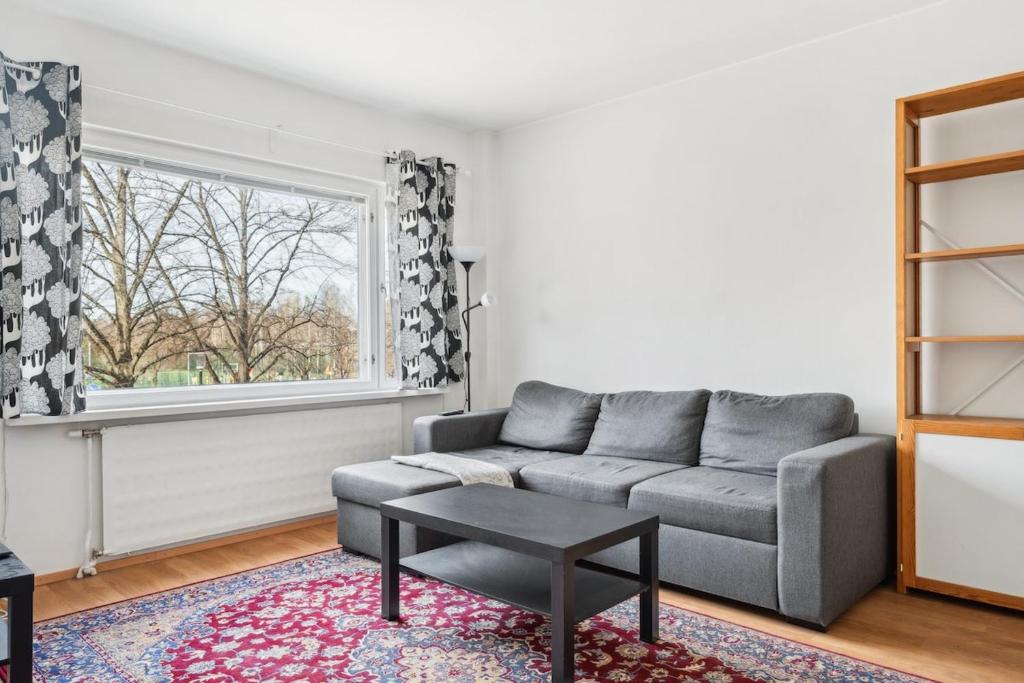 Et opholdsområde på Bright and spacious apartment