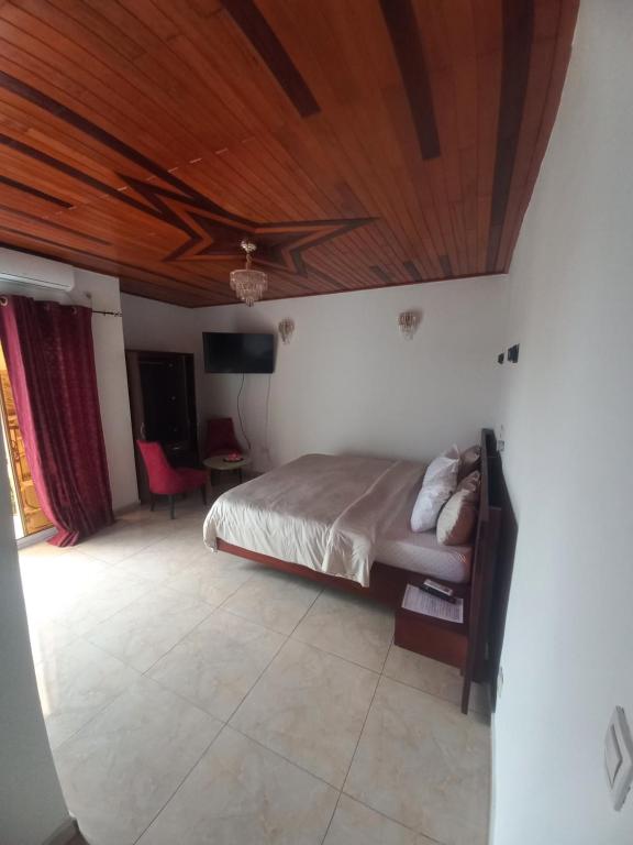 Ένα ή περισσότερα κρεβάτια σε δωμάτιο στο Jacobs Hôtel