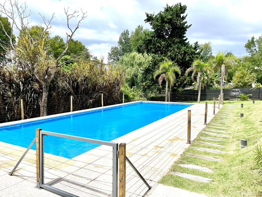 Πισίνα στο ή κοντά στο Depto Alassio 2 ambiente con parilla