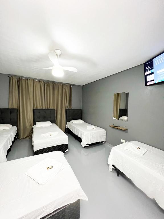 Ένα ή περισσότερα κρεβάτια σε δωμάτιο στο Hostel Anprado #12