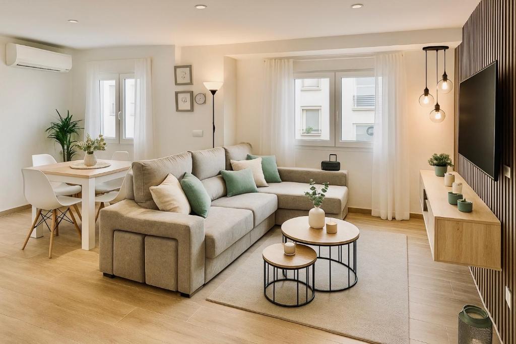 TV a/nebo společenská místnost v ubytování Tu hogar en Sevilla