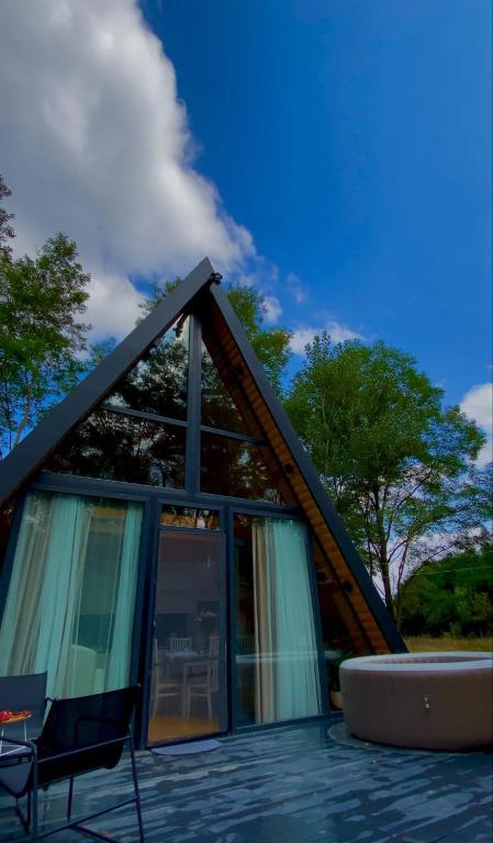 Φωτογραφία από το άλμπουμ του Lake Garden Aframe σε Vardablur