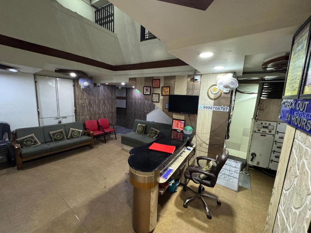 Kuchyň nebo kuchyňský kout v ubytování Hotel Kinara Inn