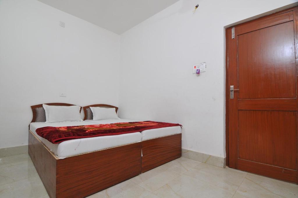 Postel nebo postele na pokoji v ubytování Rama Guest House