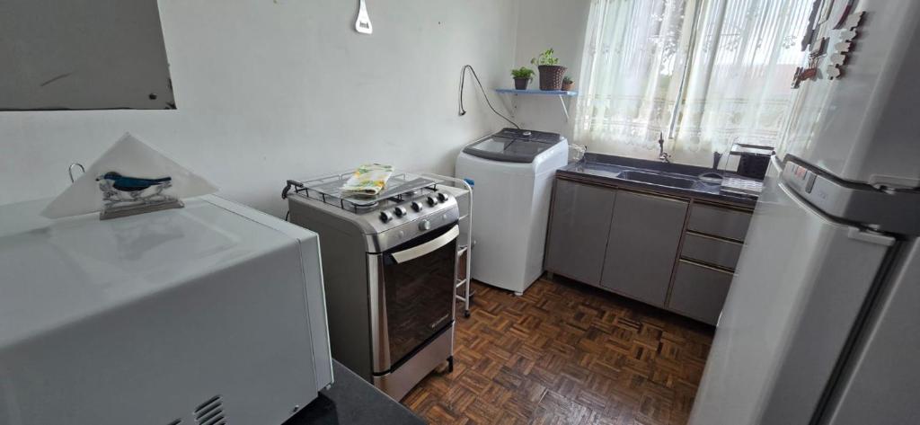 Η κουζίνα ή μικρή κουζίνα στο Casa doce Lar