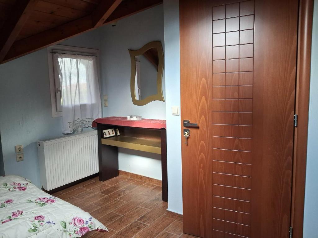 Ένα ή περισσότερα κρεβάτια σε δωμάτιο στο Chaido's attic