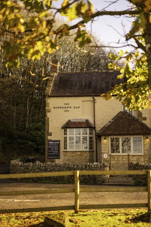 a building with a bench in front of it at Winyard's Gap Inn in South Perrott