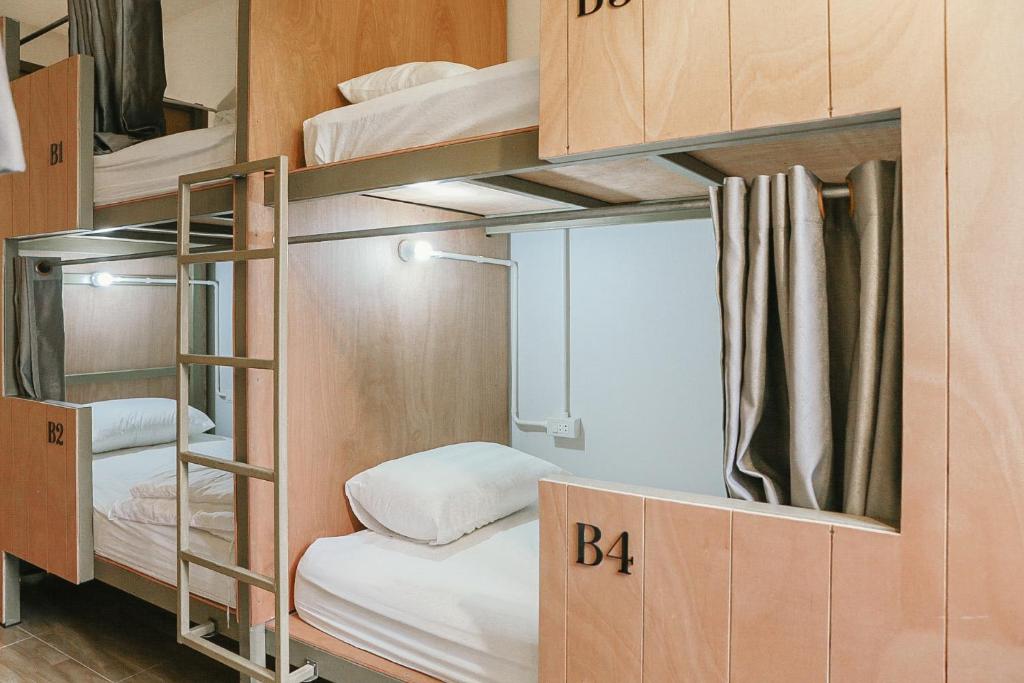 Ένα ή περισσότερα κρεβάτια σε δωμάτιο στο Jeune Hotel at Phra Singh