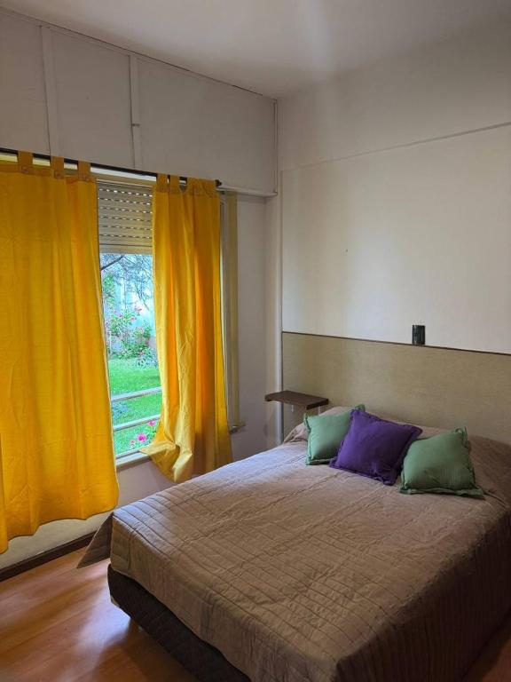 Ένα ή περισσότερα κρεβάτια σε δωμάτιο στο Apartamento J&A