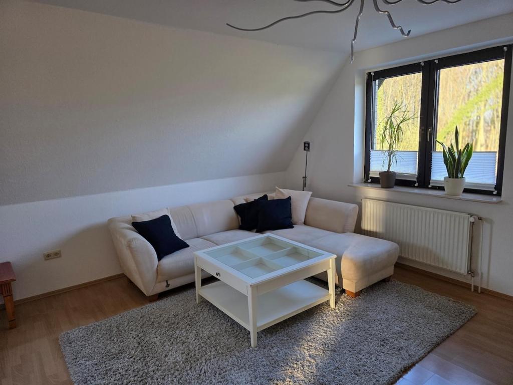 Χώρος καθιστικού στο Wohnung am Waldrand