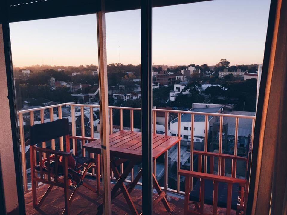 a table and chairs on a balcony with a view at Monte es Hermoso in Monte Hermoso