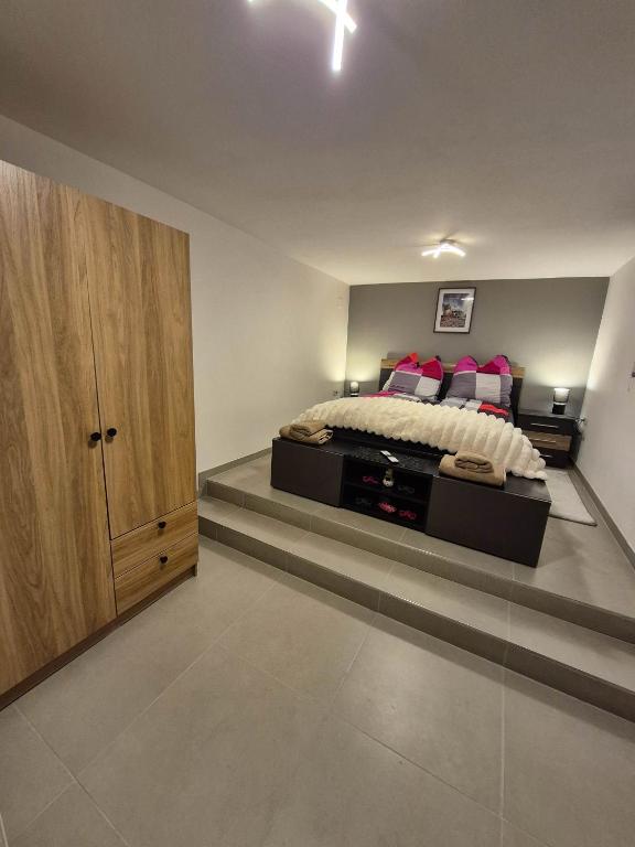 Ένα ή περισσότερα κρεβάτια σε δωμάτιο στο Ferienwhonung Mihy