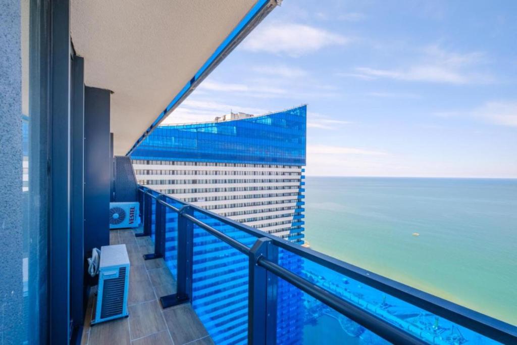 a view of the ocean from the balcony of a hotel at Glorious Sea View Aparthotel in Orbi City Batumi in Batumi