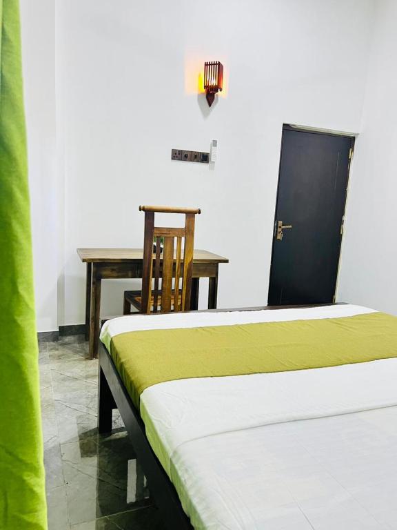 Ένα ή περισσότερα κρεβάτια σε δωμάτιο στο White House River Villa