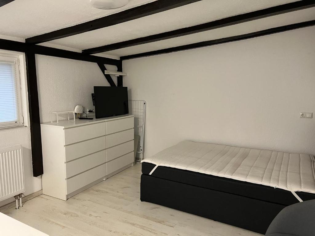 Ένα ή περισσότερα κρεβάτια σε δωμάτιο στο 1 Zimmer Häuschen