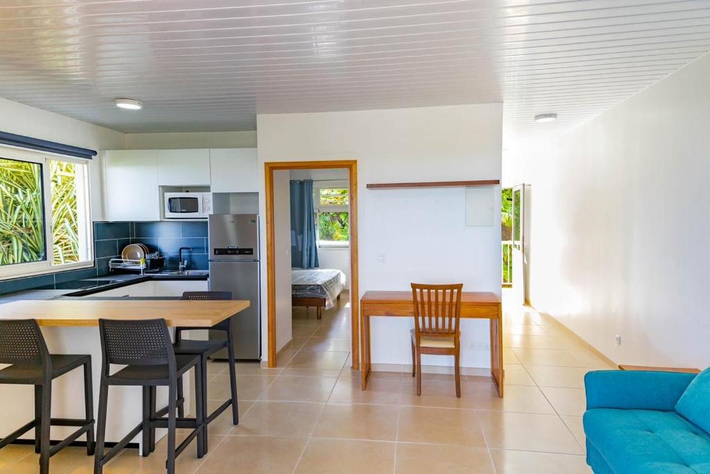 Una cocina o cocineta en Hei Tiare Apartment