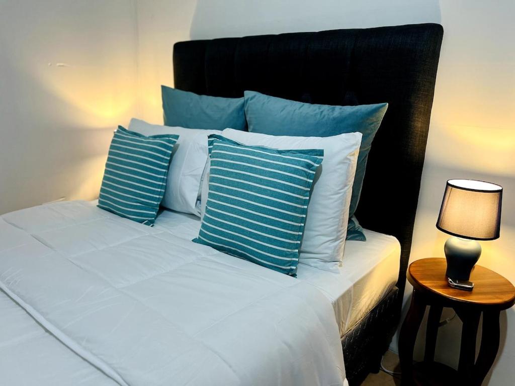 Ένα ή περισσότερα κρεβάτια σε δωμάτιο στο Alto Cruz Executive Loft