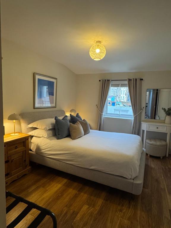 En eller flere senge i et værelse på One Abbey Court