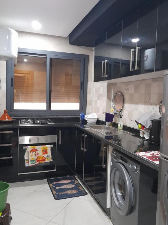 Η κουζίνα ή μικρή κουζίνα στο Residen NIZAR