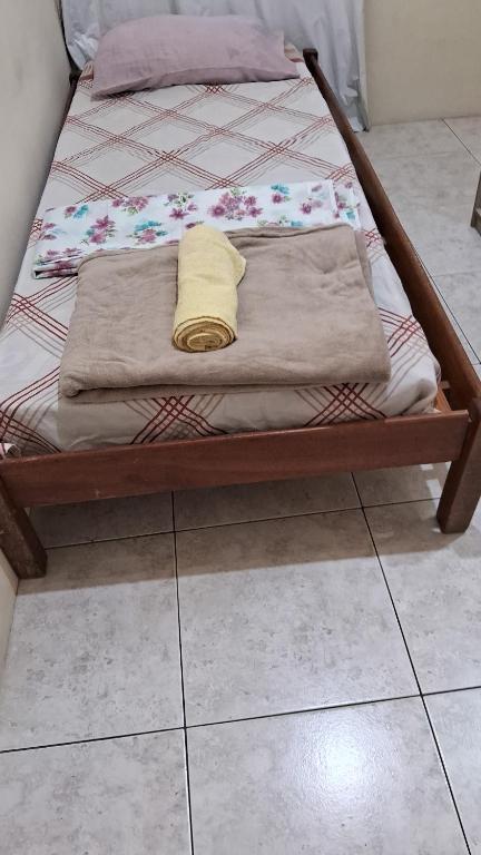 Giường trong phòng chung tại Apartamento pra Ferias,Condominio Dona Belinha