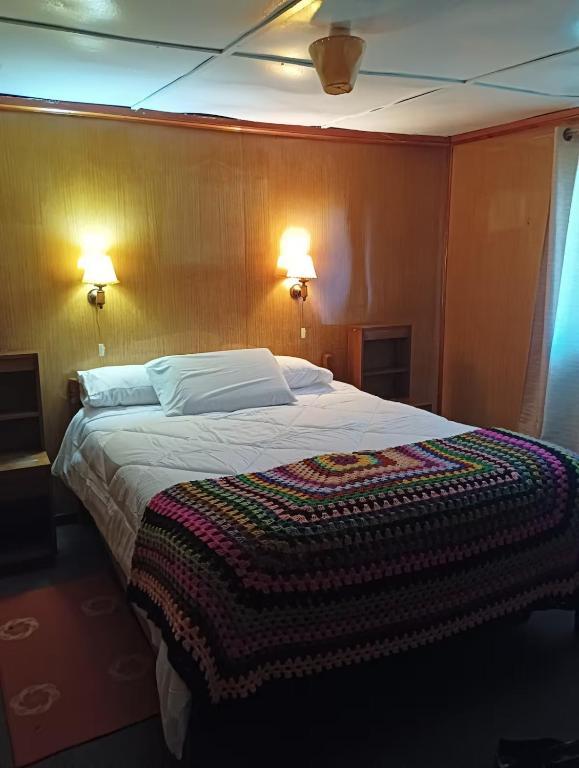 Ένα ή περισσότερα κρεβάτια σε δωμάτιο στο casa amoblada