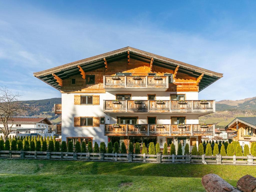 a large building with balconies on it at Bergzeit Hollersbach XL in Hollersbach im Pinzgau