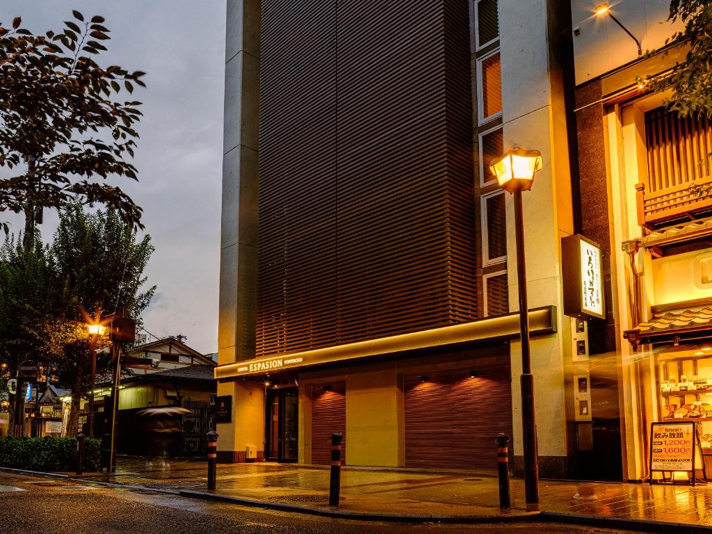 a street light in front of a building at Hotel Espasion Pontocho in Kyoto