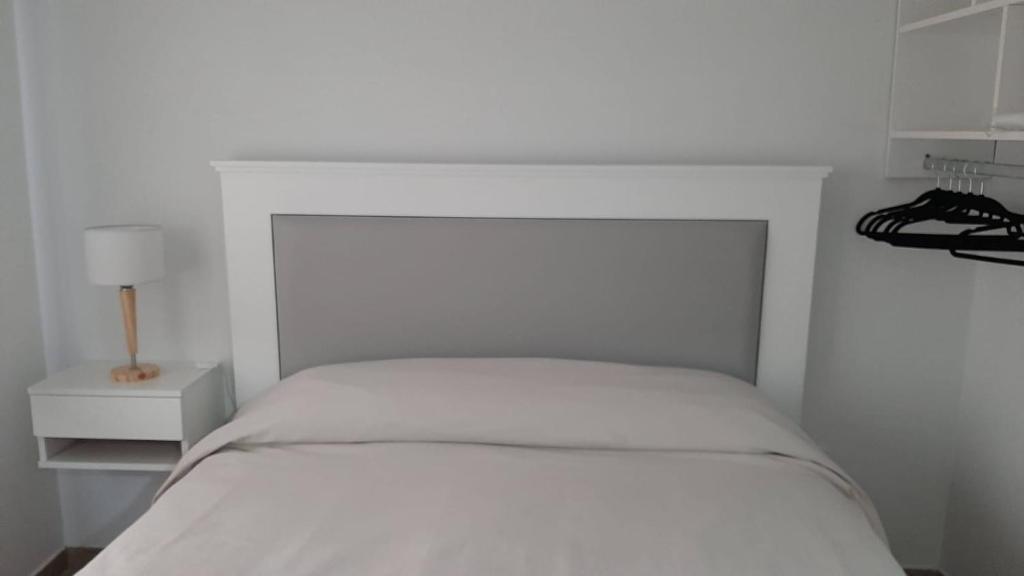 Кровать или кровати в номере El Estudio Céntrico con cochera