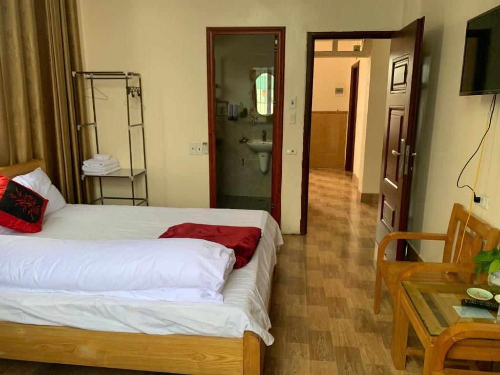 Ένα ή περισσότερα κρεβάτια σε δωμάτιο στο Kim dat hotel