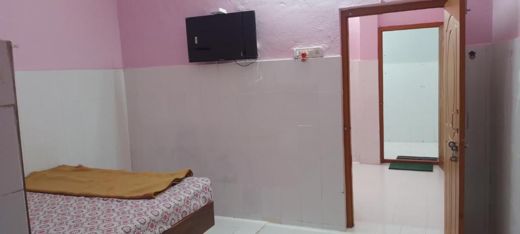 Et tv og/eller underholdning på Sri Sri Residency Mantralayam