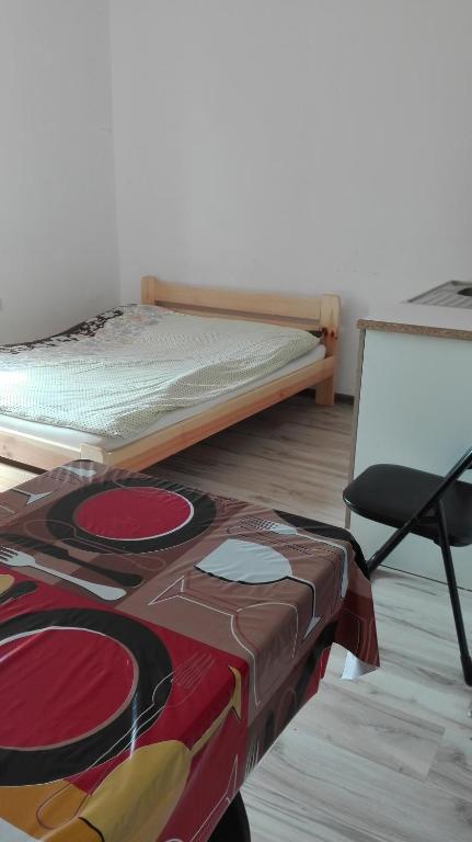 Postel nebo postele na pokoji v ubytování Pokoje Typu Studio Sosnowiec
