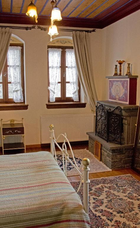Postel nebo postele na pokoji v ubytování Melinas Boutique Hotel B&B