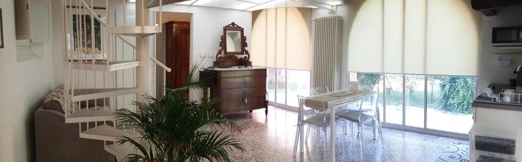 Część wypoczynkowa w obiekcie Relais Pacinotti Apartments