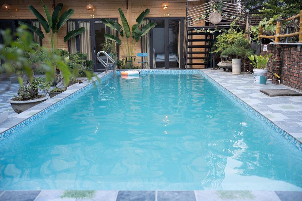 Πισίνα στο ή κοντά στο Tamcoc Athletic Bungalow & Villa