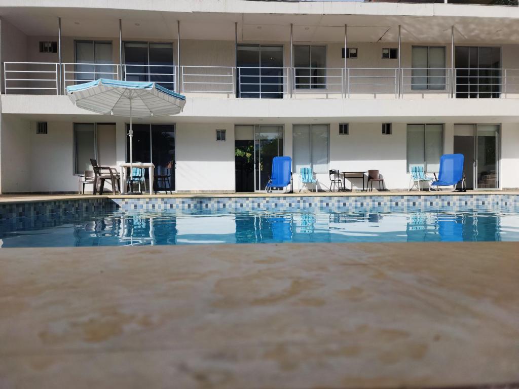 Bazén v ubytování Villa Canela Alojamiento Rural Melgar- Carmen de Apicalá Vda-Bombote nebo v jeho okolí